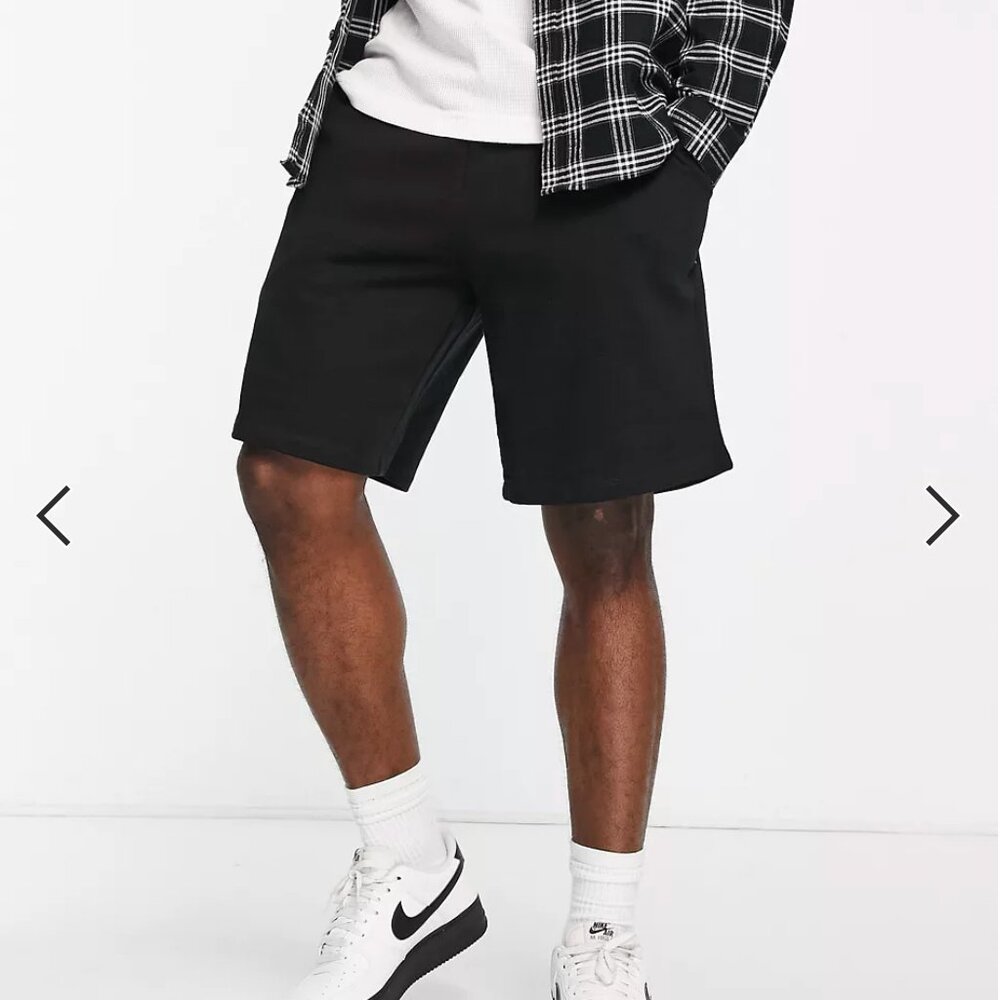 ASOS oversized jersey shorts in black